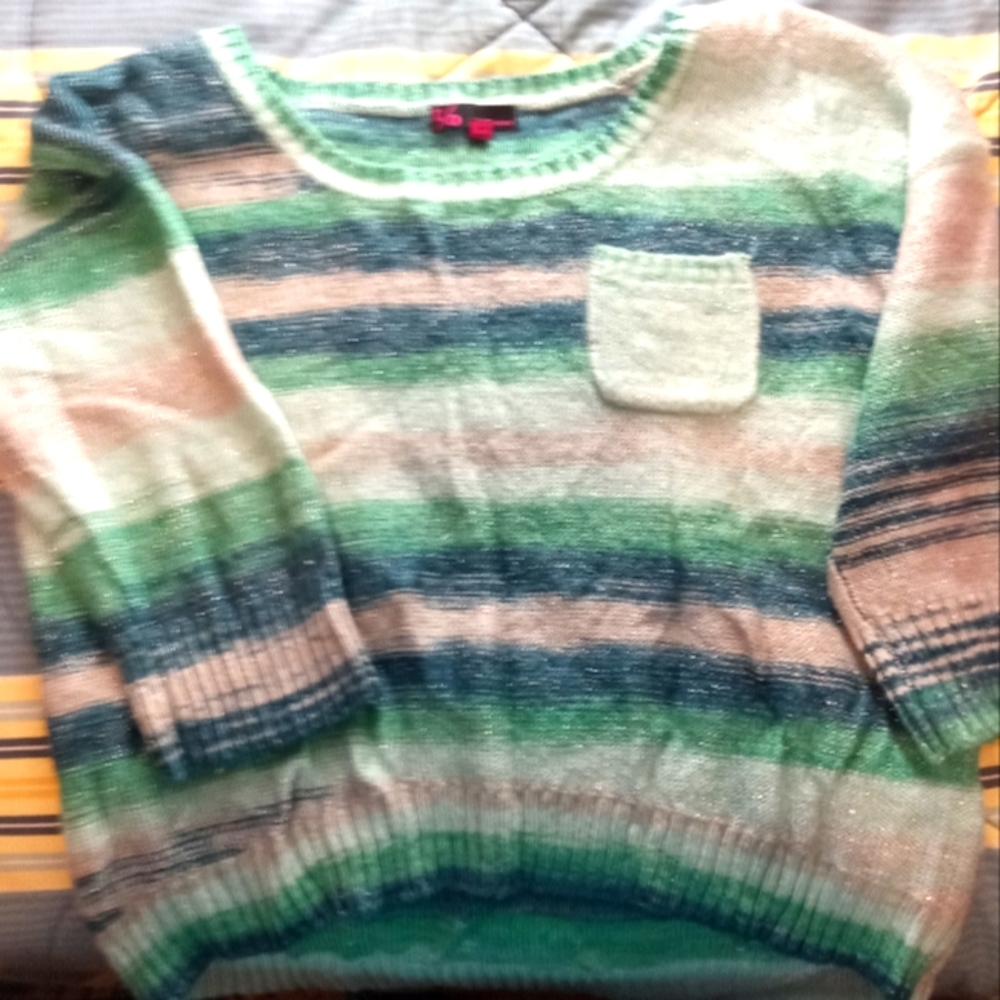 Women's Very cute Sweater by  t/o size XL with no spots, stains,and NO picks.